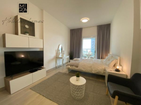 Serviced Studio in Bloom Heights by Mira Holiday Homes